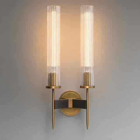 Front view of two light copper wall sconce with clear fluted glass shades