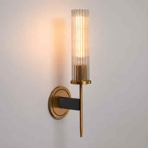 Single light fluted glass wall sconce with gold finish copper frame