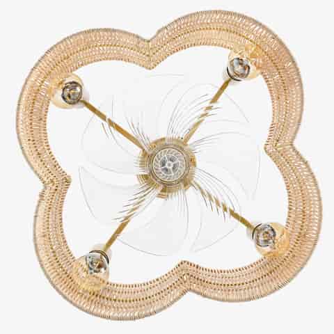 Bottom view of woven fandelier ceiling fan with clear hidden blades and four light layout