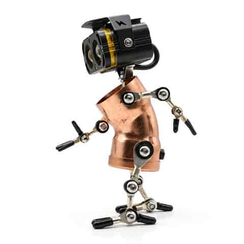 Close up side view of an industrial steampunk robot lamp with copper tone body, black dual lens head and articulated metal limbs
