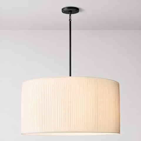 Large ivory pleated fabric drum pendant light with black metal suspension hardware