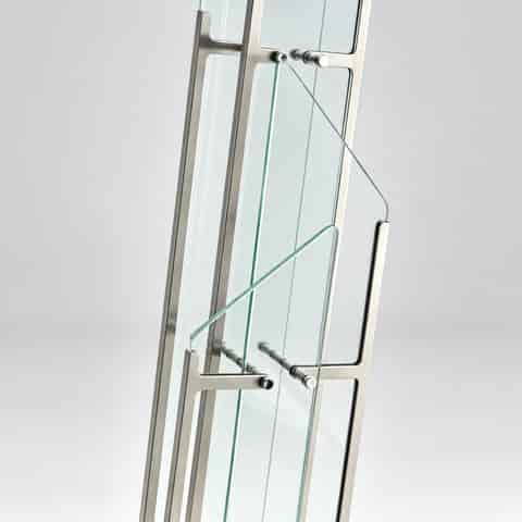 Modern sculptural glass LED table lamp with layered geometric panels and brushed metal frame