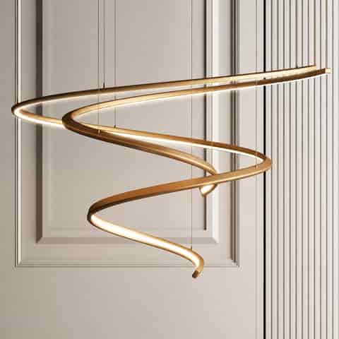 Close up of electroplated gold spiral LED chandelier showing smooth stainless steel curves and continuous warm light channels
